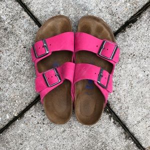 Bright pink Birkenstocks.